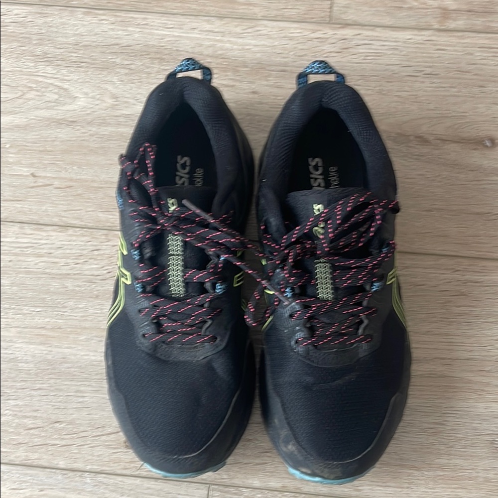 ASICS Black Sneakers with Red and Yellow Accents
